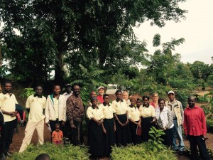 Project team and reviewers posing for a group photo with Elgon Trust Women Group. Photo Catherine Muthuri